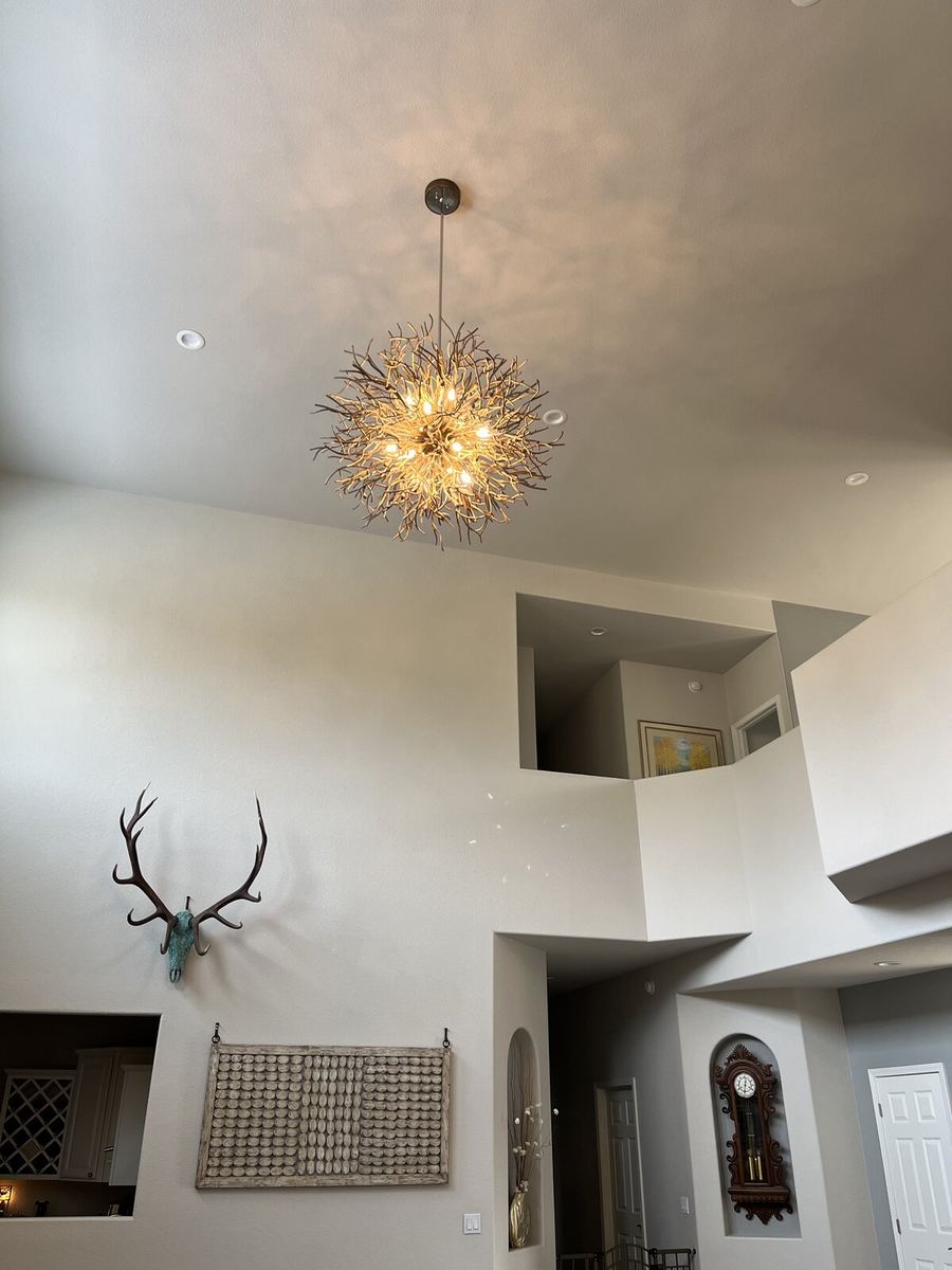 22-foot atrium chandelier installation in residential foyer