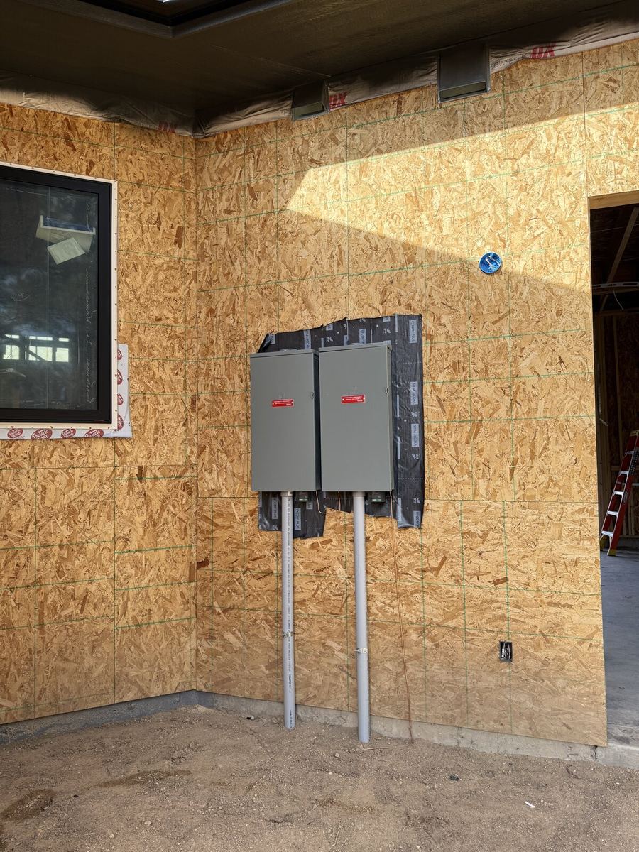 Single breaker panel installed in a wood-framed new construction wall